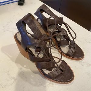 Brown leather Solsana tie up sandals. Size 7.